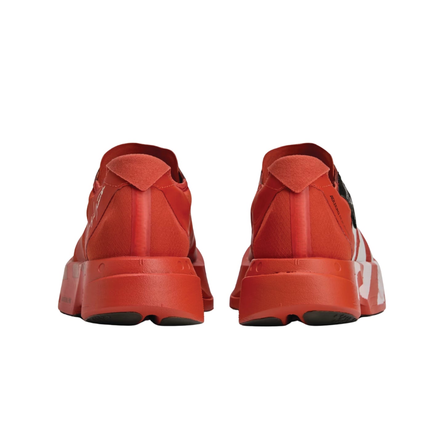 Adidas Y-3 Adios Pro 4 running shoe in the orange colorway.