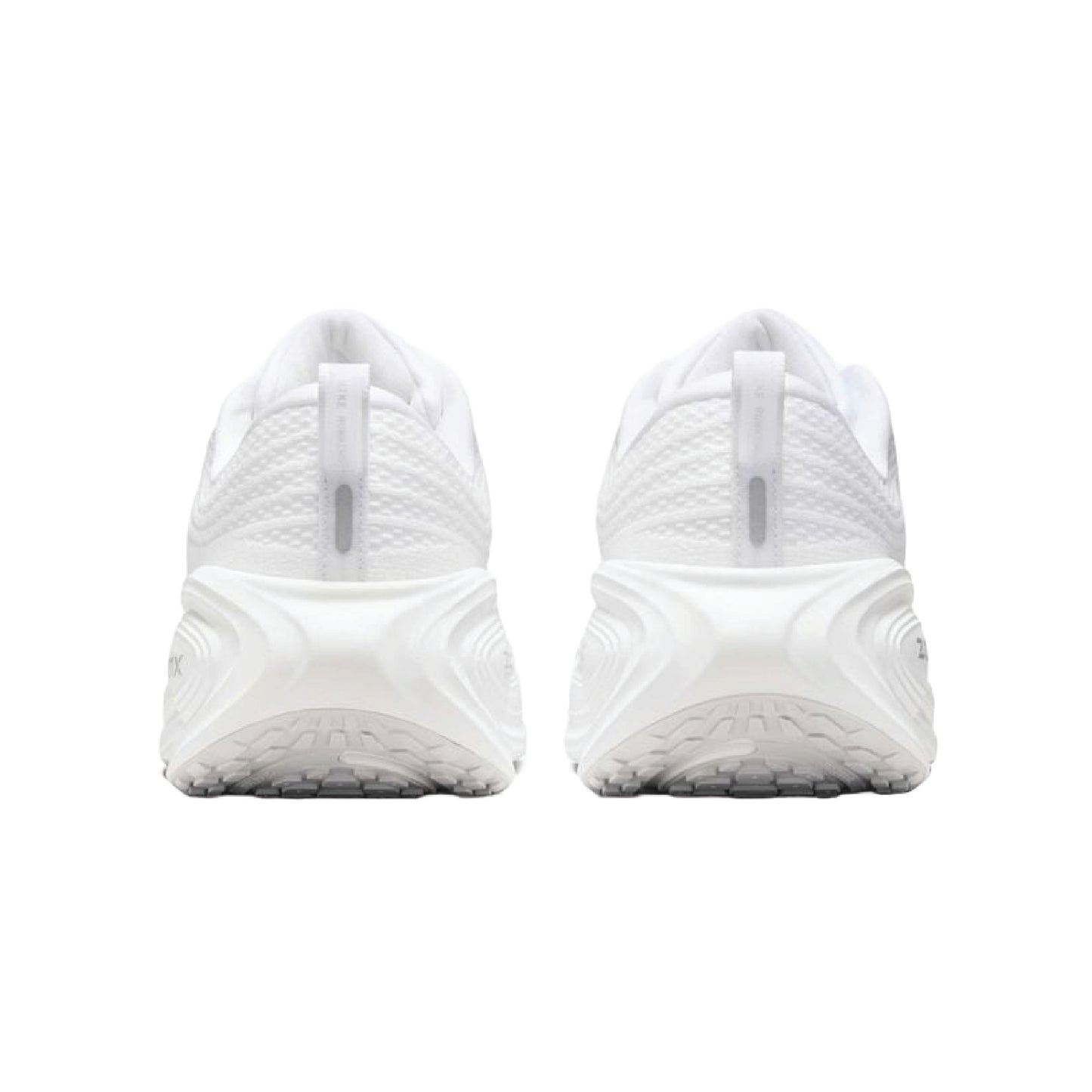 Nike Vomero Plus road running shoes all-white.